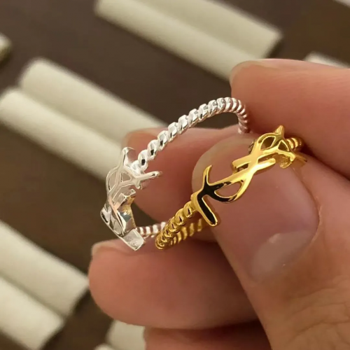 Yves Saint Laurent YSL Cassandre Twisted Ring Elegant Jewelry Gold and Silver