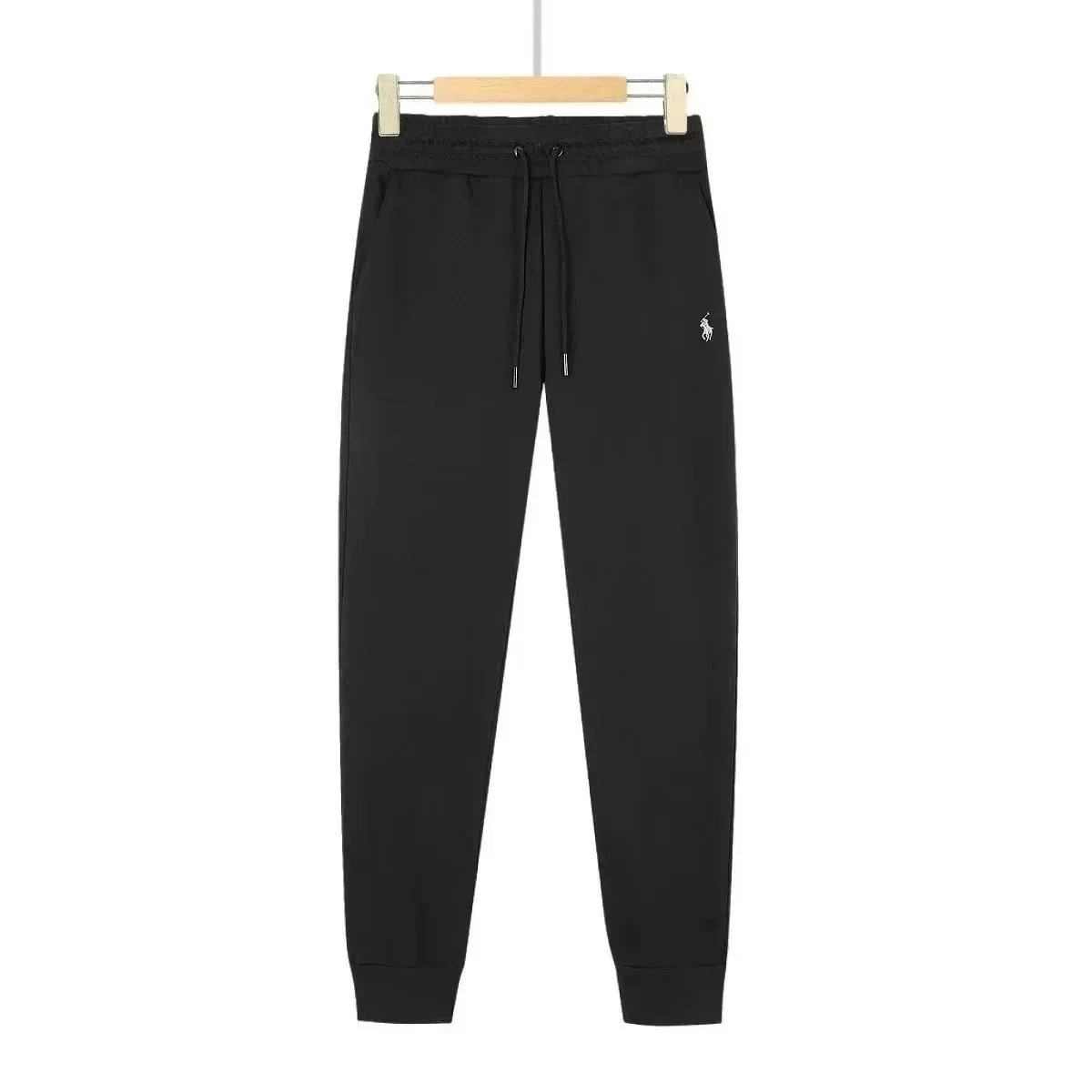 Black pants with a white label Black pants with a white label